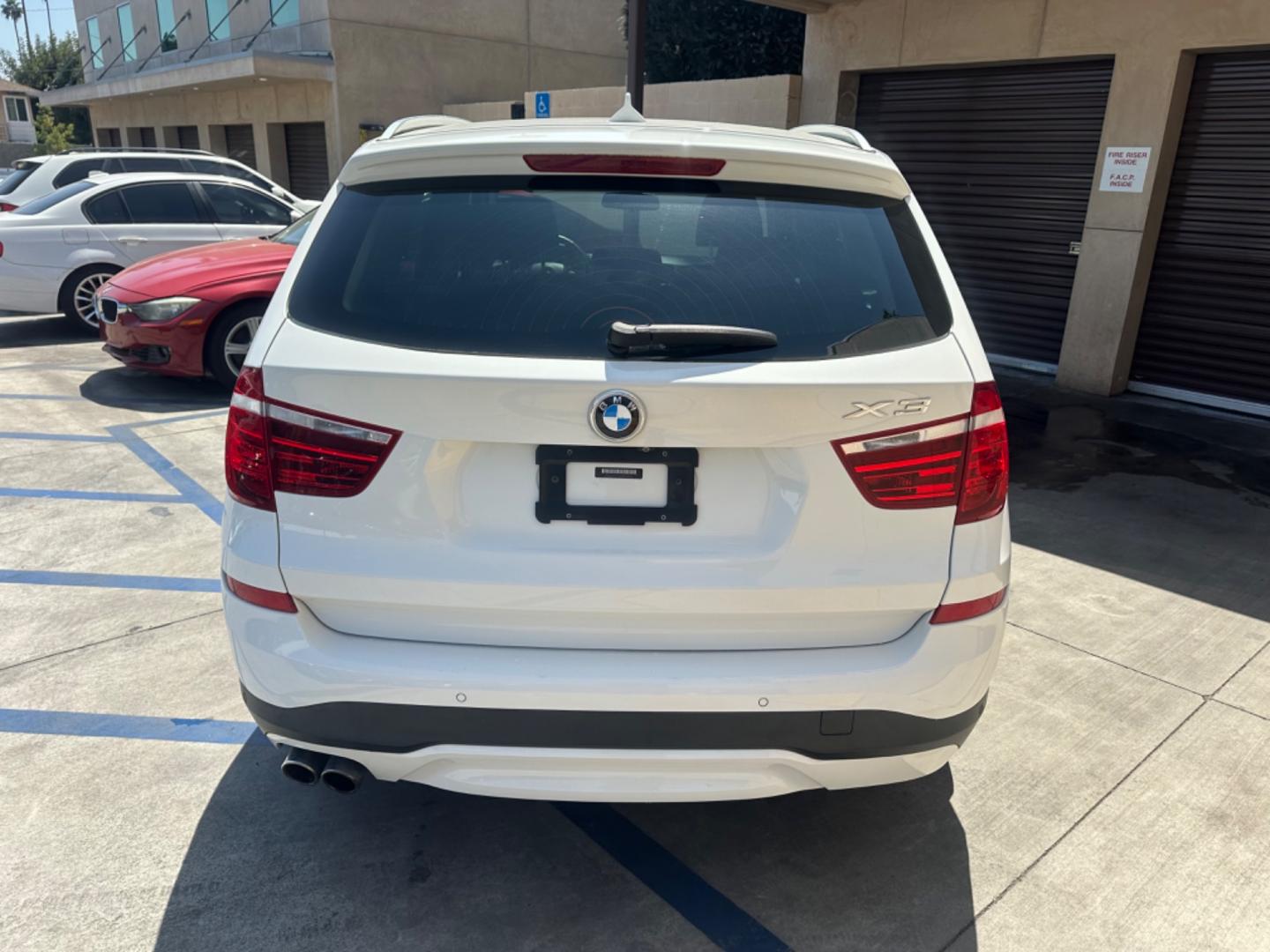 2017 WHITE /BLACK BMW X3 (5UXWX9C37H0) , located at 30 S. Berkeley Avenue, Pasadena, CA, 91107, (626) 248-7567, 34.145447, -118.109398 - Photo#3